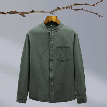 Green men's tailored fit button-up shirt, ideal for casual or formal summer events.