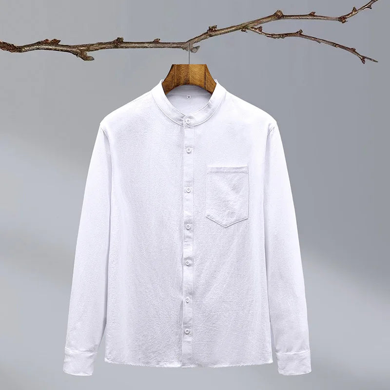Blue men's tailored fit button-up shirt, featuring a stand collar for a sharp look.