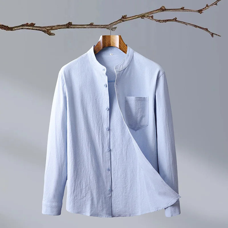 Black men's tailored fit button-up shirt, a stylish piece for modern men's apparel.