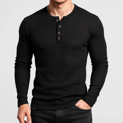 Comfortable men's long sleeve Henley shirt with tailored fit. Ideal for versatile casual wear & fall layering.