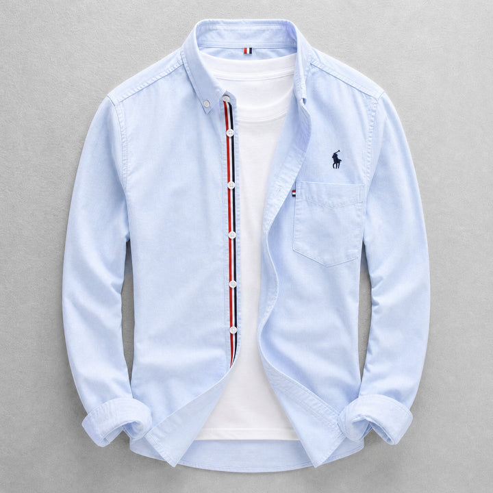 Men's tailored fit long sleeve Oxford shirt, button-down collar, classic style for smart casual or business attire.