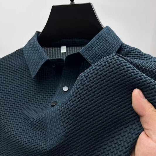 Men's tailored fit performance polo. Breathable, moisture-wicking fabric for golf or casual sophisticated wear.