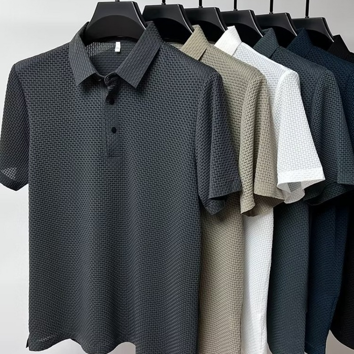 Sophisticated men's performance polo. Tailored fit, moisture-wicking & breathable for modern casual fashion.