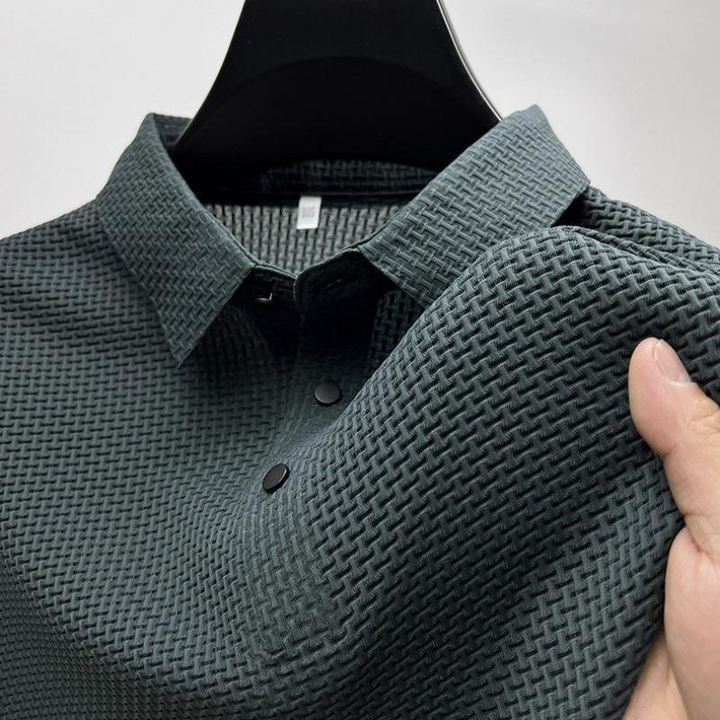 Sophisticated men's summer polo. Breathable, moisture-wicking tailored fit, perfect for golf or casual wear.
