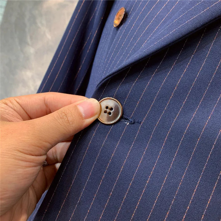 Sharp men's navy blue pinstripe suit. Classic formal wear for business attire, tailored fit & elegant design.