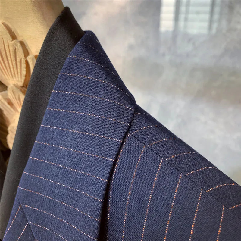 Professional men's double-breasted navy blue pinstripe suit. Perfect for sophisticated business and formal events.