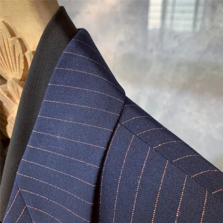 Professional men's double-breasted navy blue pinstripe suit. Perfect for sophisticated business and formal events.