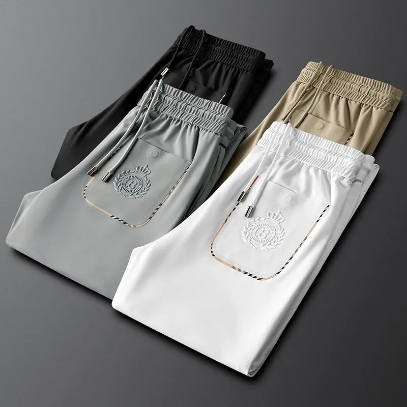 Close-up of the fine cotton fabric on men's tailored slim fit dress pants.