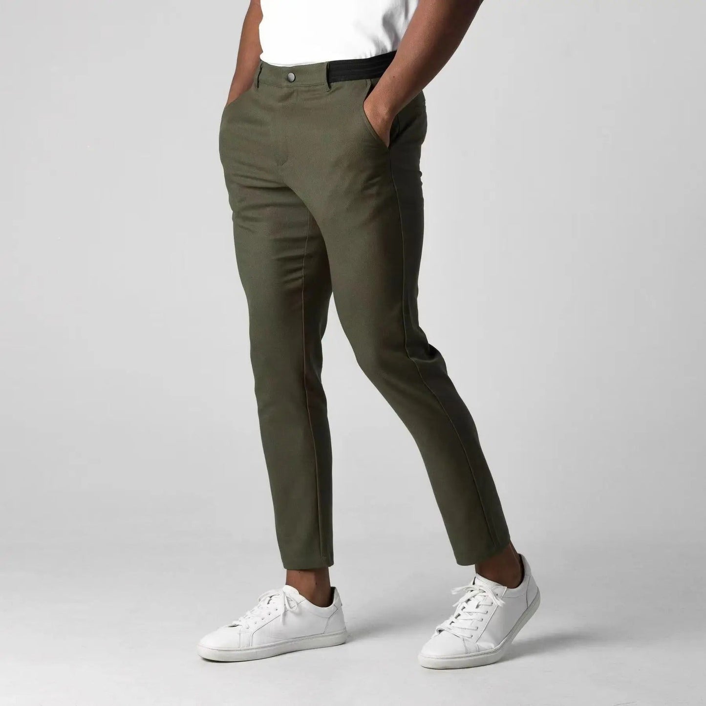 Tailored fit men's stretch chinos. Comfortable cotton blend casual pants for versatile modern everyday wear.
