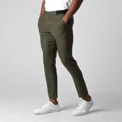 Tailored fit men's stretch chinos. Comfortable cotton blend casual pants for versatile modern everyday wear.