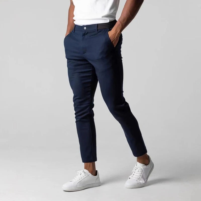 Stylish men's tailored stretch chinos. Everyday comfort pants, wrinkle-resistant cotton blend for versatile wear.