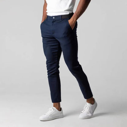 Stylish men's tailored stretch chinos. Everyday comfort pants, wrinkle-resistant cotton blend for versatile wear.