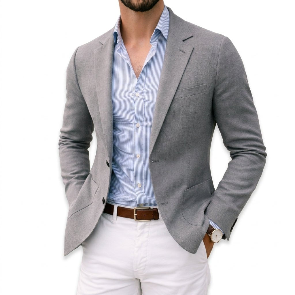 Sharp men's tailored fit blazer, ideal for smart casual, office, or formal events. A versatile suit jacket.
