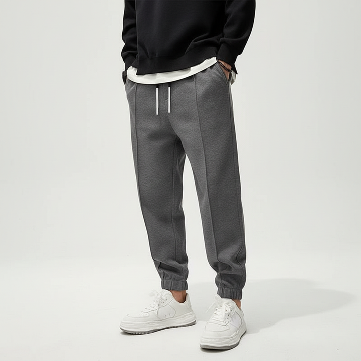 Tanner men's performance joggers with elastic waist. Versatile activewear for sports, workouts, and leisure.