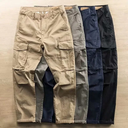 Stylish gray men's tapered cargo pants, ideal for casual fashion, providing comfort & a modern fit.
