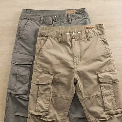 Navy blue men's tapered cargo pants, versatile for casual wear, workwear, and active everyday style.