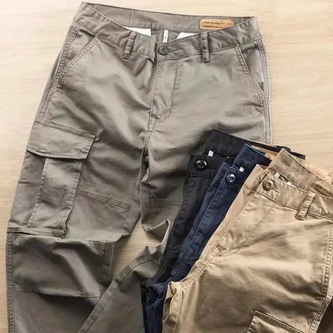 Sleek black men's tapered cargo pants, essential for modern mens fashion, offering comfort and utility.