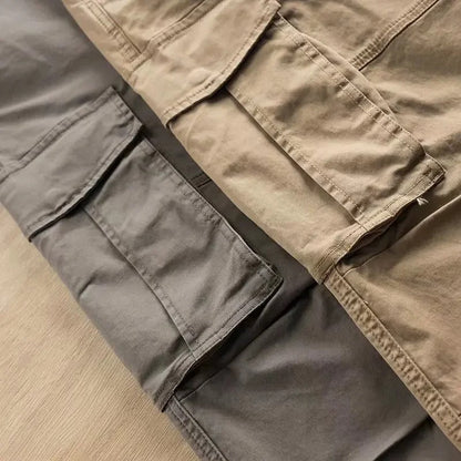 Men's utility cargo pants with a trendy tapered fit, perfect for functional workwear & casual style.