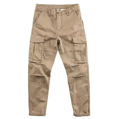Detailed view of side pockets on men's tapered cargo pants, highlighting practical utility and design.