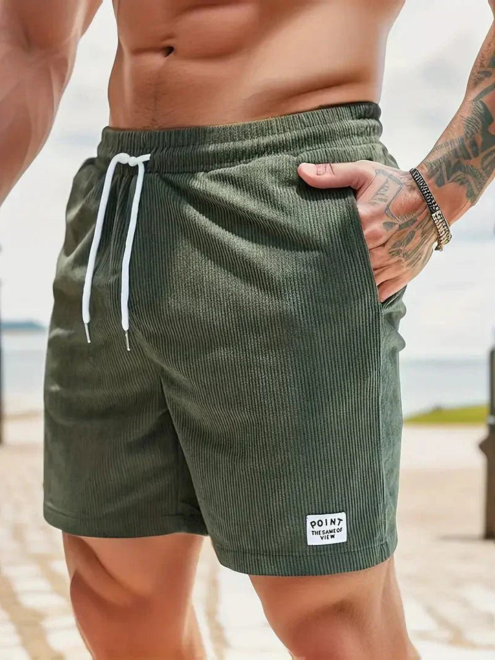 Men's textured drawstring shorts for casual comfort & everyday wear. Relaxed fit summer bottoms.