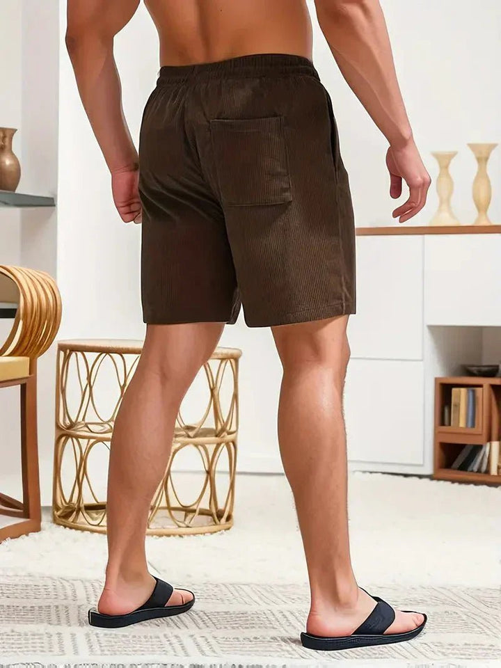 Go-to men's textured drawstring shorts. Comfortable & stylish for everyday casual summer activities.