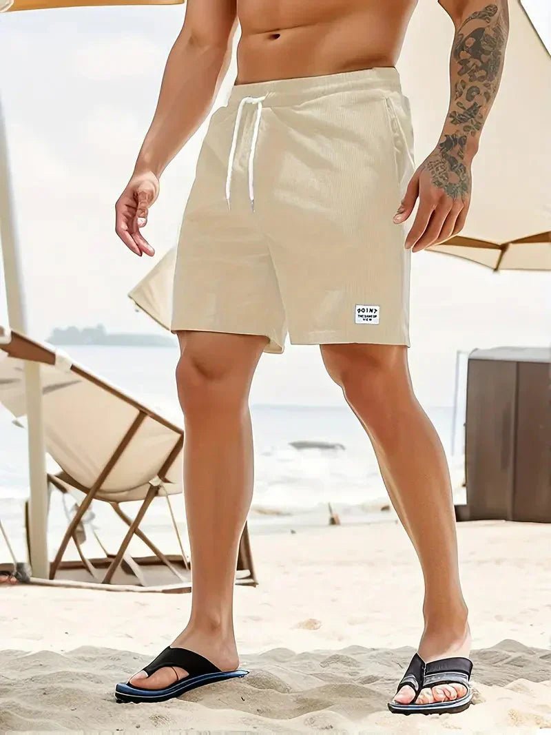 Breathable men's textured drawstring shorts. Comfortable, relaxed fit for casual summer everyday wear.