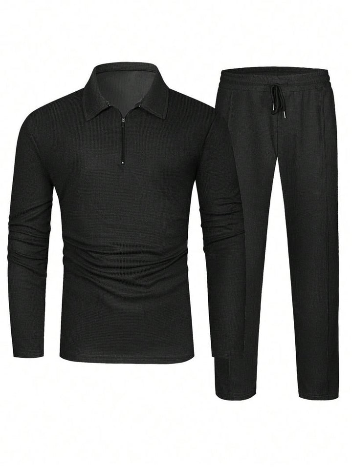 Casual men's two-piece lounge set, relaxed fit, zip neck top, and drawstring pants. Perfect for comfort and style.