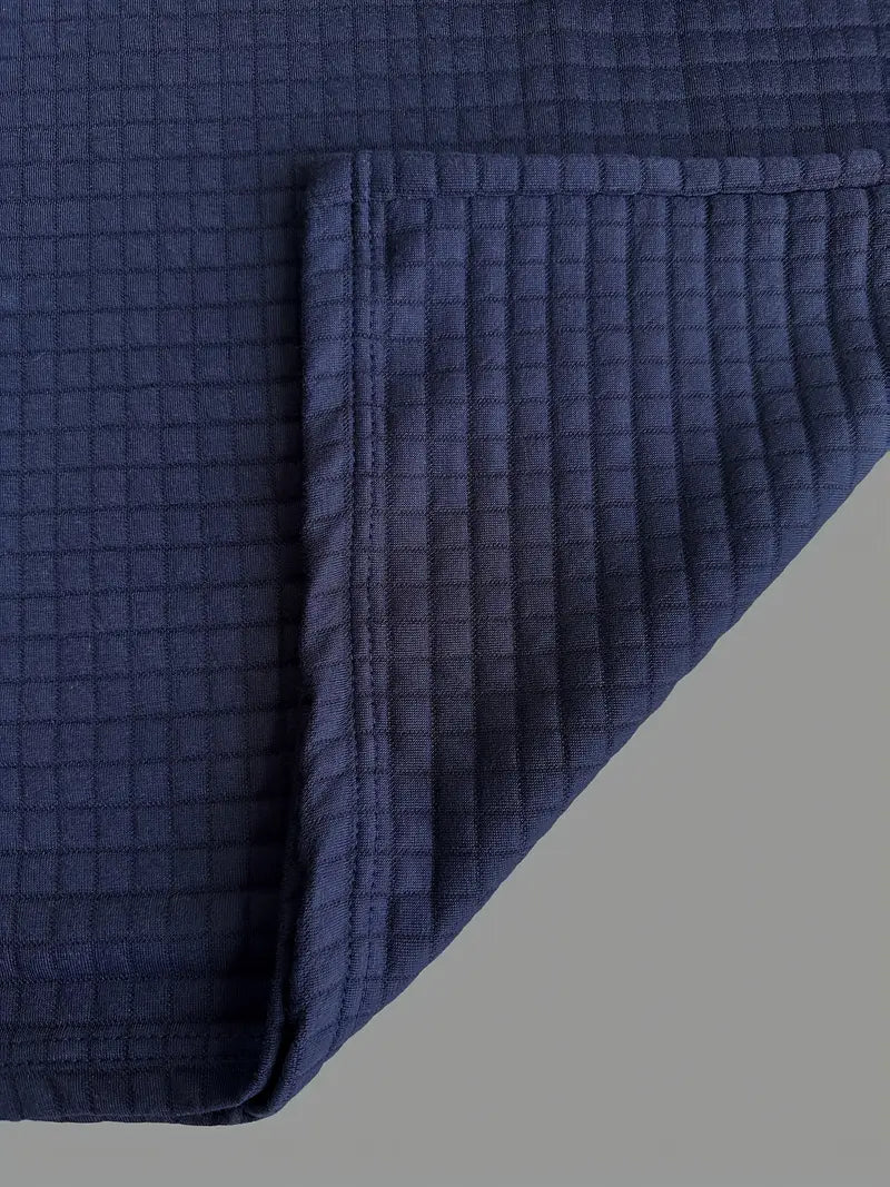 Essential men's textured long sleeve polo shirt, offering smart casual style and everyday versatility.