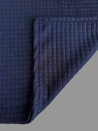 Essential men's textured long sleeve polo shirt, offering smart casual style and everyday versatility.