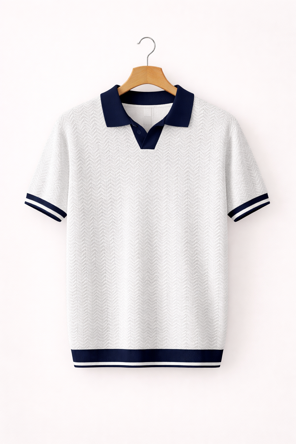 Full shot of a man wearing a blue short sleeve textured polo shirt, styled for a modern casual look.