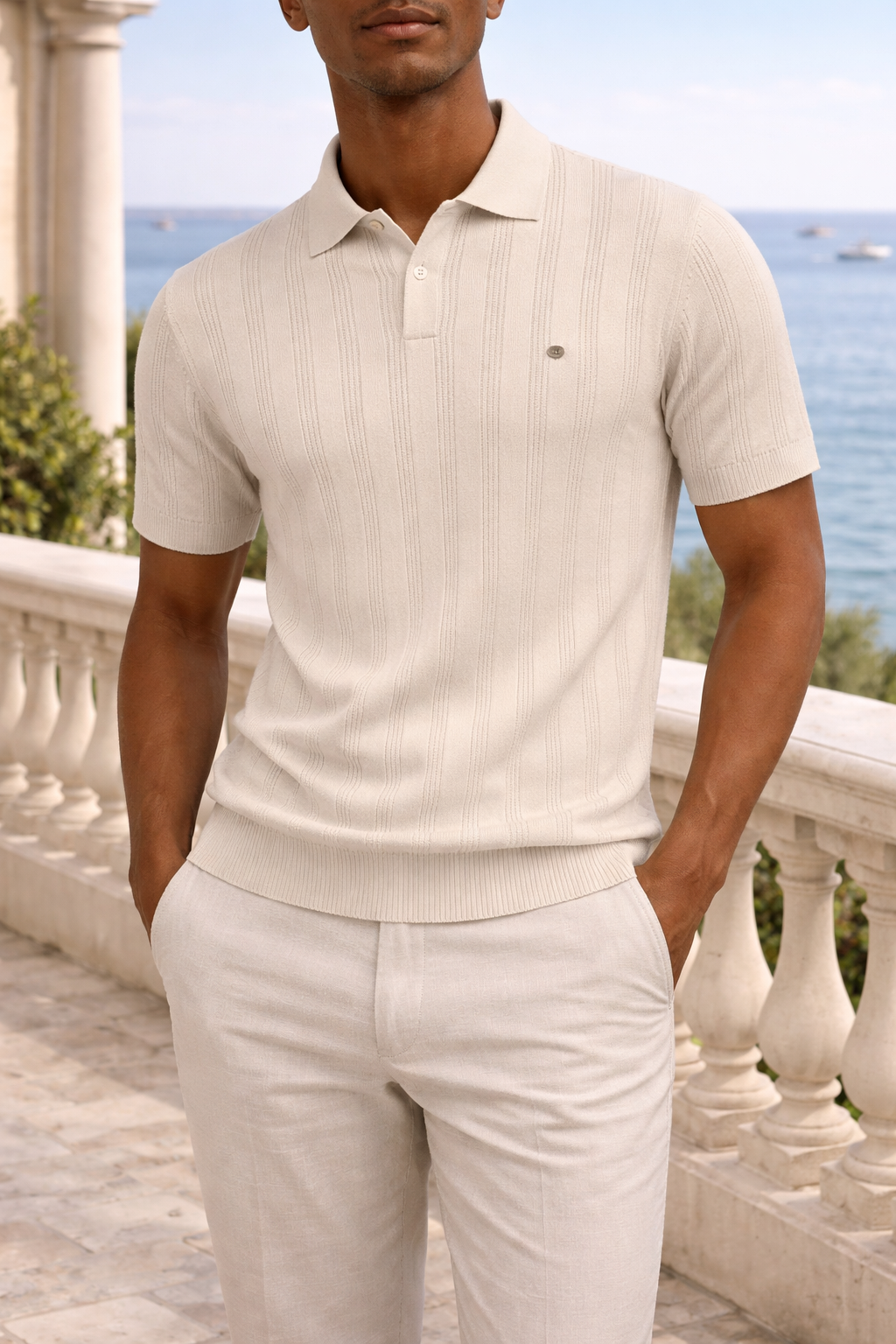 Versatile men's textured polo shirt for a modern smart casual look, featuring a classic button placket.