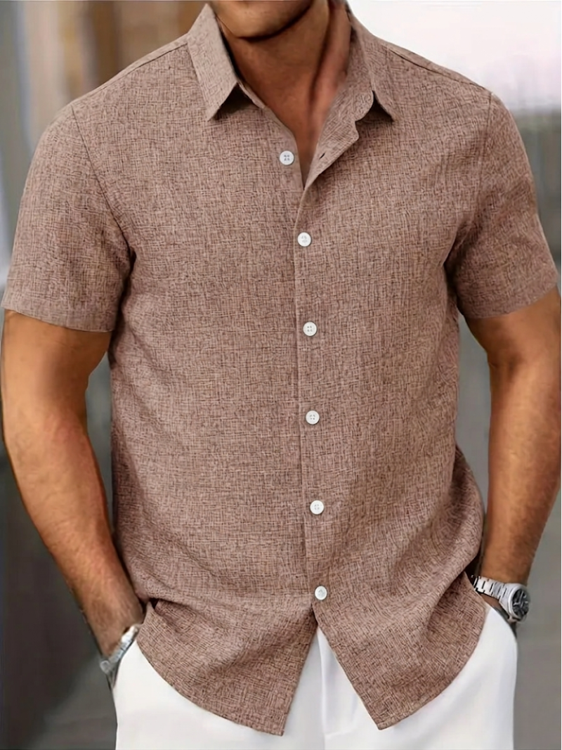 Summer-ready men's textured polo shirt, short sleeve, regular fit, button-down. Essential casual collared shirt.