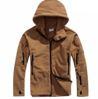 Action shot of man wearing thermal fleece tactical jacket outdoors, showcasing durability for hiking