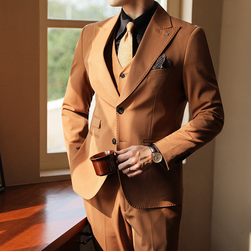 Men's three-piece formal suit for weddings & events. Tailored slim fit design.