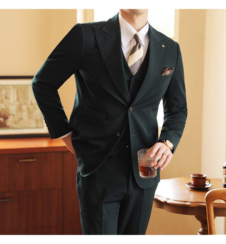 Modern men's three-piece formal suit. Sleek tailored design for weddings, events & contemporary fashion.