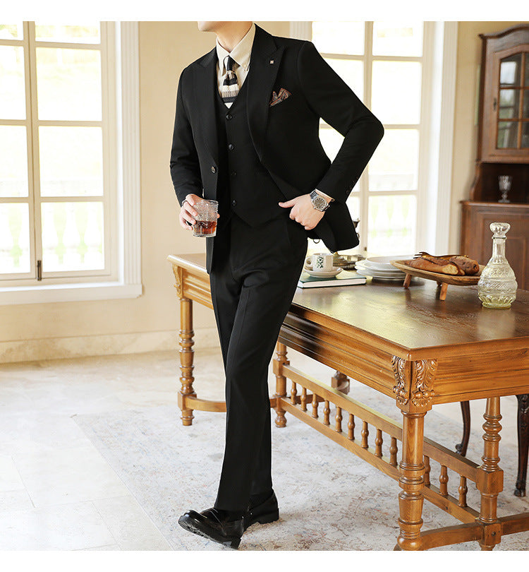 Versatile men's three-piece suit. Adaptable formal attire for weddings, galas, parties & business functions.