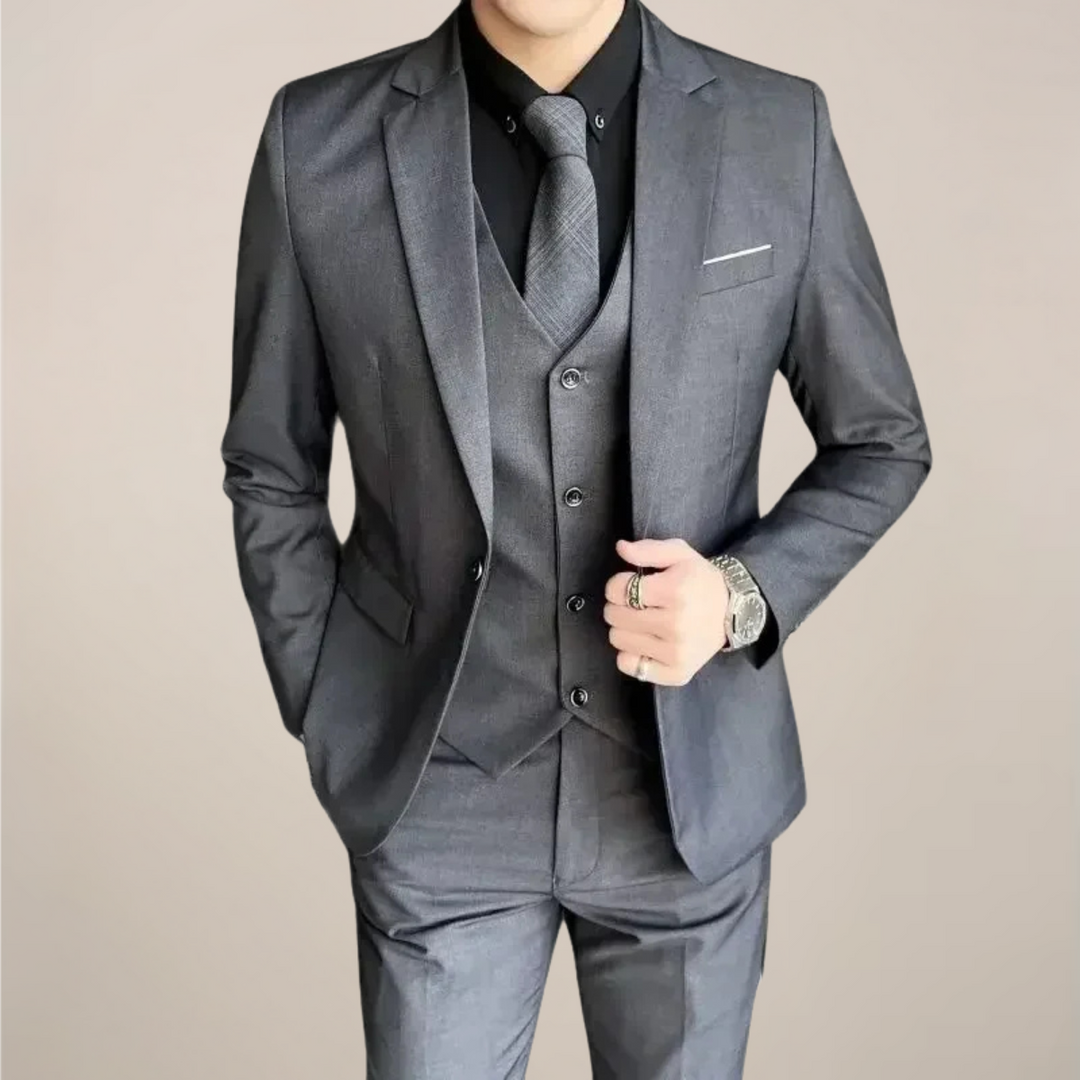 Men's three-piece slim fit business suit in classic style, perfect for professional events & formal wear.