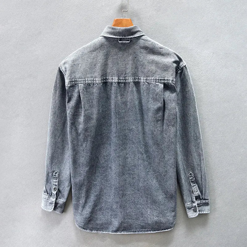 Black men's casual button-up shirt. Versatile long-sleeve top for everyday timeless style.