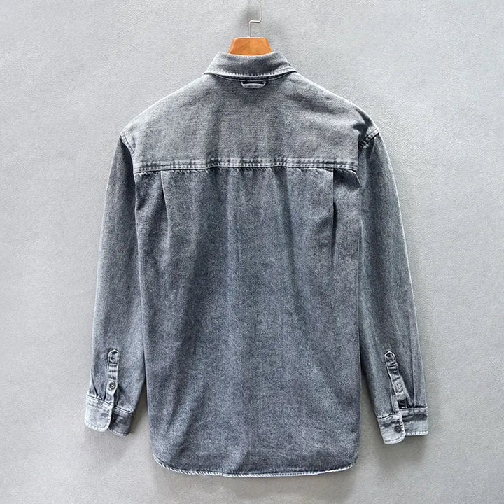 Black men's casual button-up shirt. Versatile long-sleeve top for everyday timeless style.