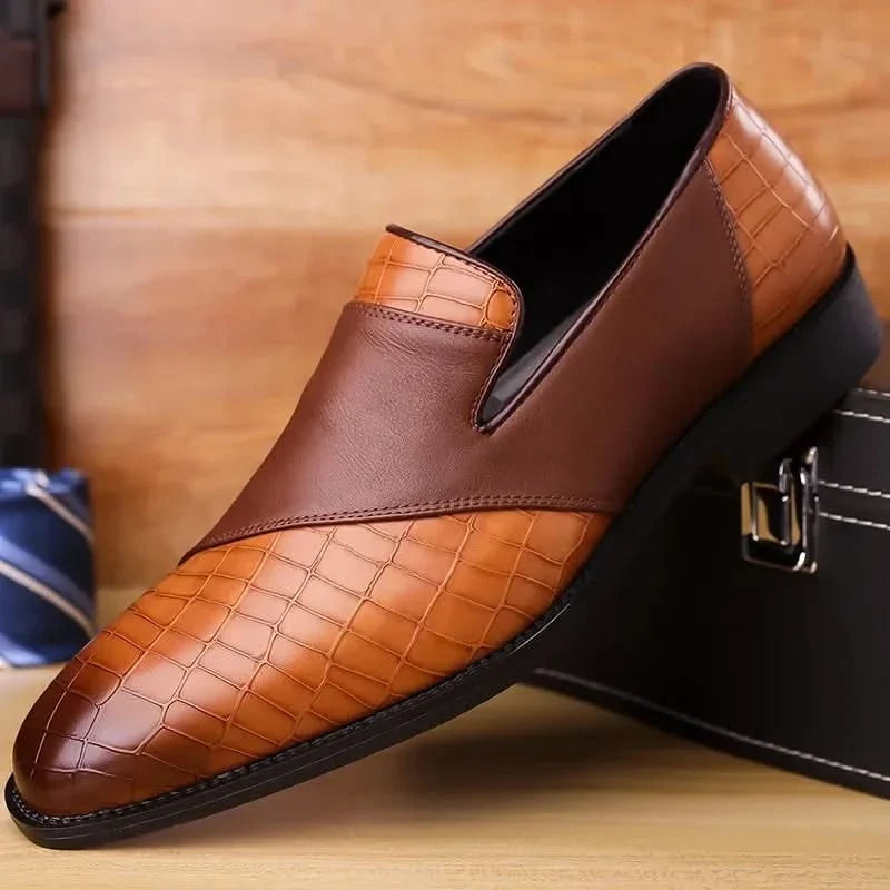 Dark brown men's slip-on loafers, perfect for dress or casual everyday wear. Comfortable classic footwear.