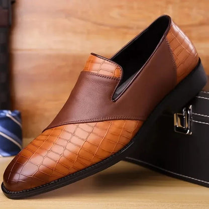 Dark brown men's slip-on loafers, perfect for dress or casual everyday wear. Comfortable classic footwear.