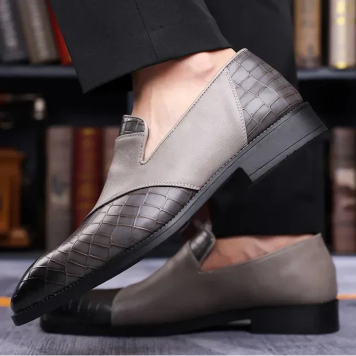 Side view of men's classic slip-on loafers, a timeless design for everyday comfort & sophisticated style.