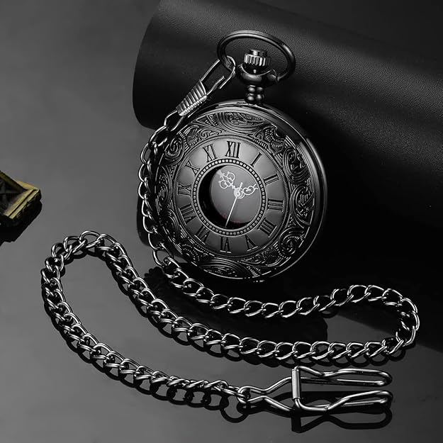 Detailed view of men's antique-look pocket watch dial with intricate design & chain.