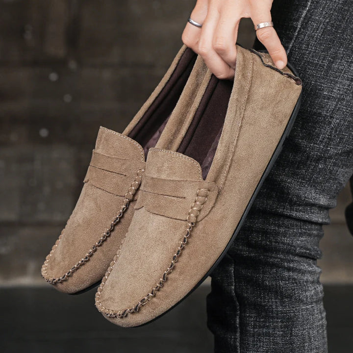 Navy men's Tivoli penny loafers, combining classic design with all-day comfort for versatile casual & dress wear.