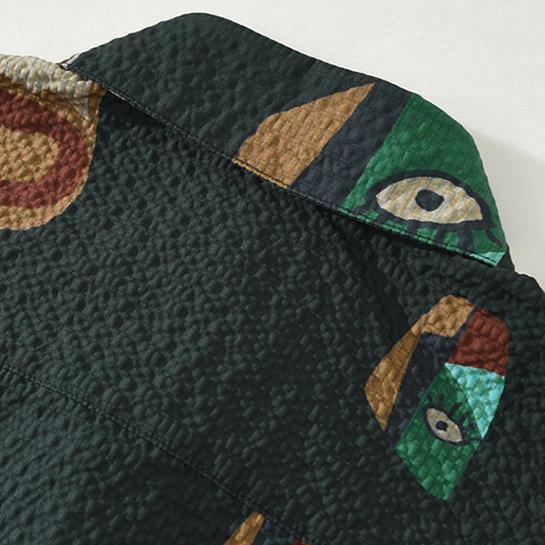 Stylish men's button-up shirt with an intricate tribal art and Cubist print. Unique, comfortable fit.