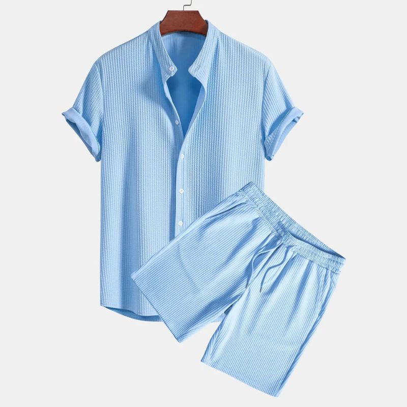 Men's two-piece polo set with stylish mandarin collar, perfect for casual summer wear. Relaxed fit & breathable knit.