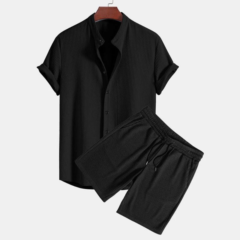 Relaxed fit men's two-piece polo set, breathable knit fabric & mandarin collar. Versatile for summer casual outfits.