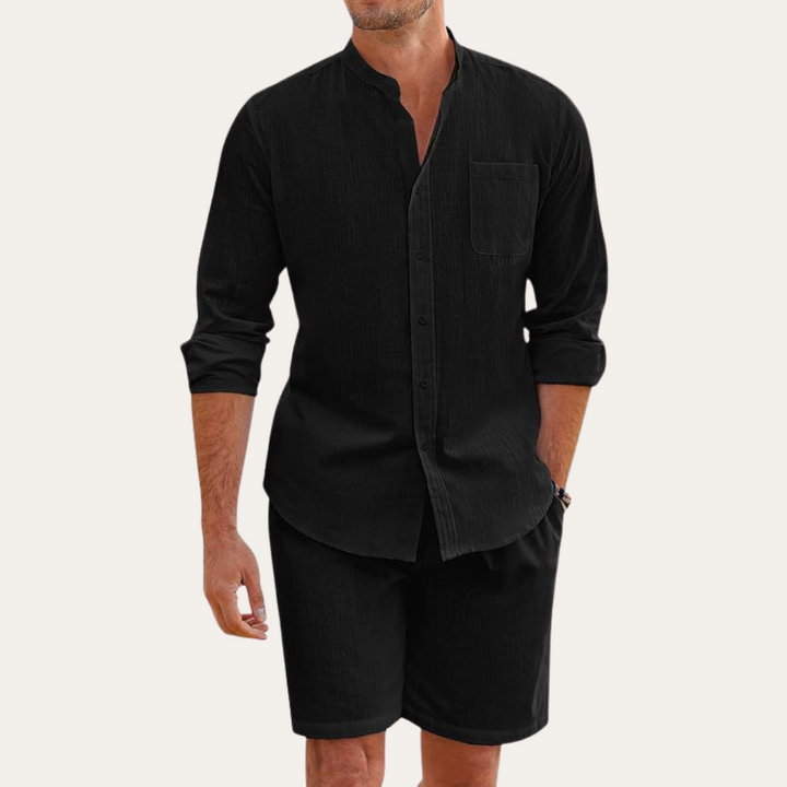 Men's two-piece summer set with long sleeve shirt & matching shorts. Ideal for beach or casual wear.