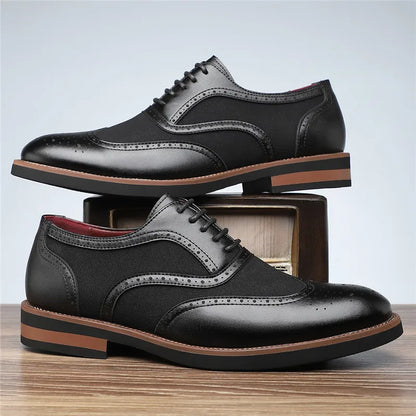 Stylish men's two-tone oxfords with classic brogue detailing, perfect for formal events.