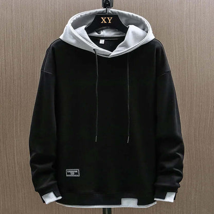 Warm men's two-tone pullover hoodie in a relaxed fit, perfect for everyday casual wear & comfort.